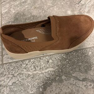 Skechers women’s  tan suede Slip-On Shoes